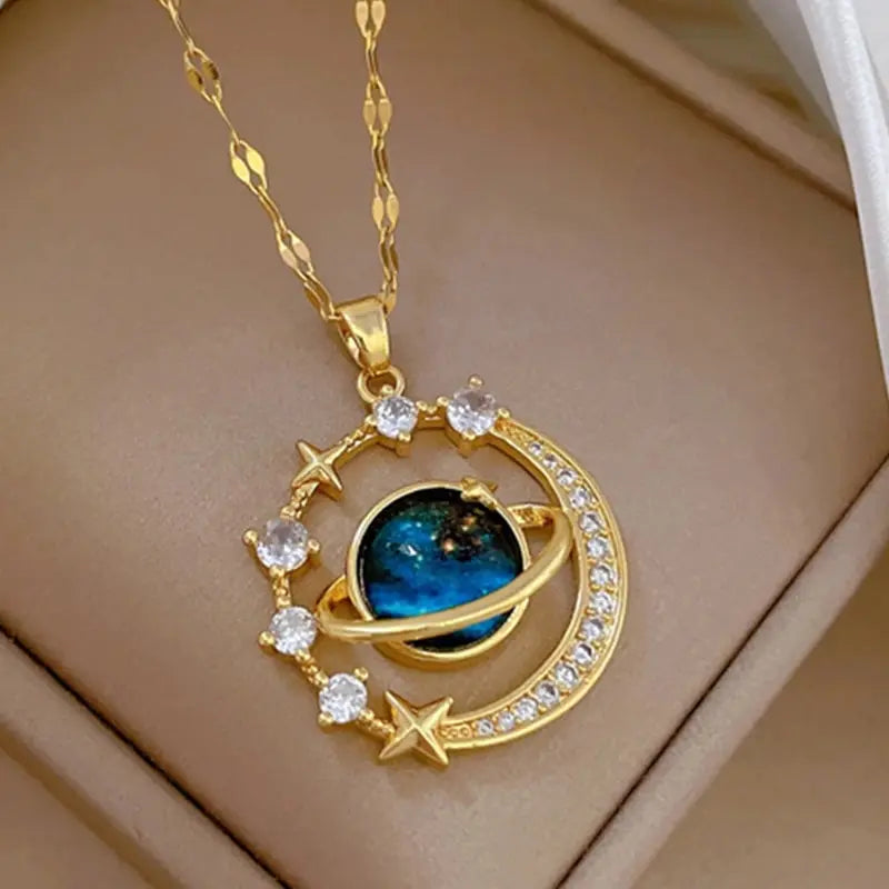Unknown Product gold celestial pendant necklace with blue planet and star accents on chain