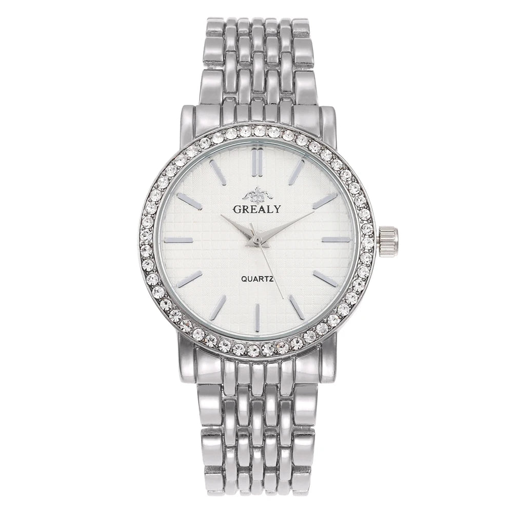 Silver wristwatch with a white face and visible brand name on a white background