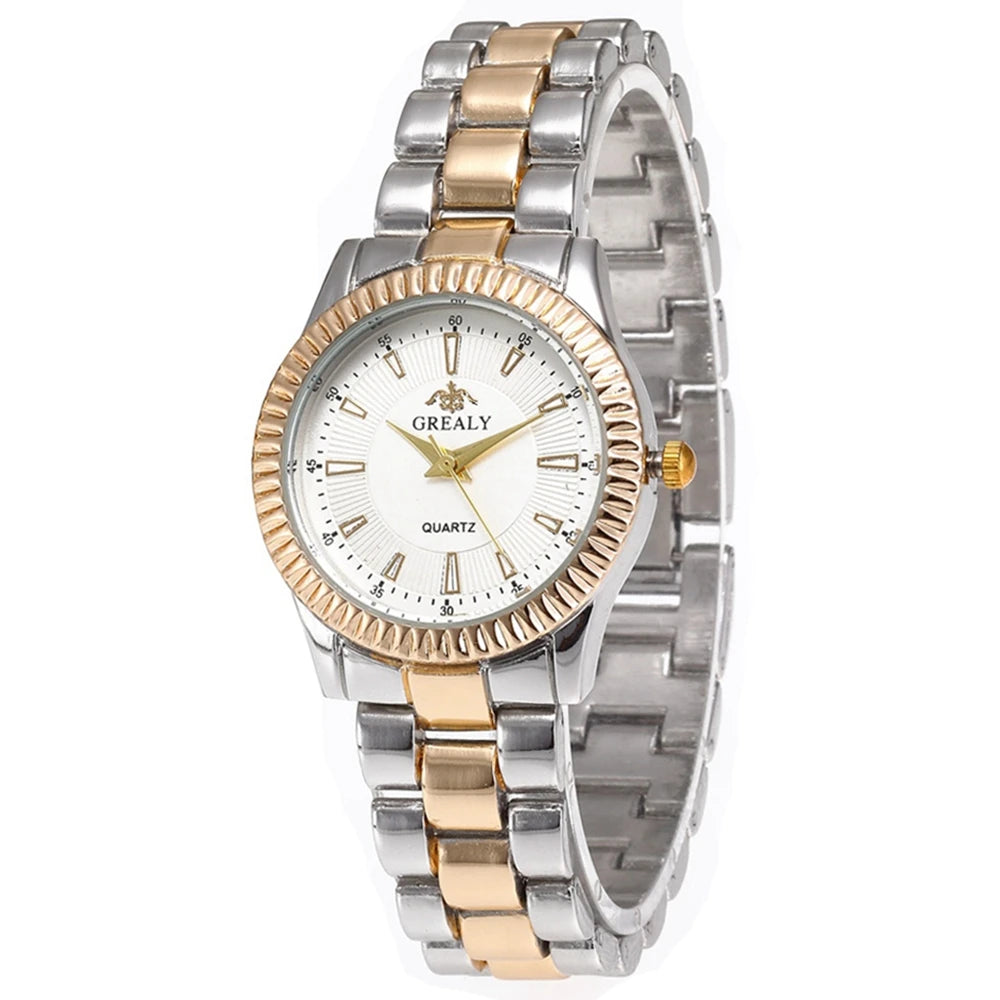 Two-tone silver and rose gold watch with white face on a white background