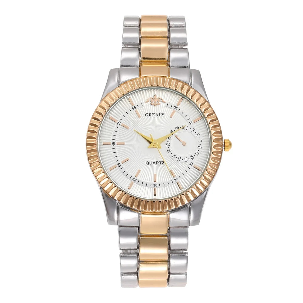 Two-tone silver and gold watch with white face on a white background